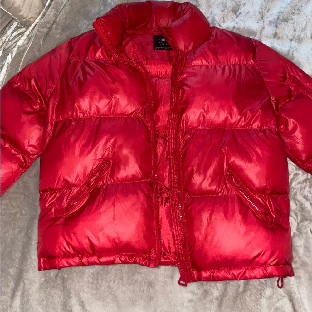 Red puff jacket. Size M. Very warm. True to size.